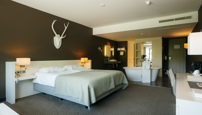 Comfortkamer ligbad, douche & terras/balkon - Van der Valk Hotel Apeldoorn - de Cantharel 1
